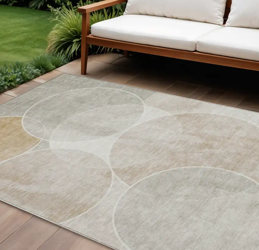 Beige Ivory And Gold Geometric Washable Indoor Outdoor Area Rug Photo 1