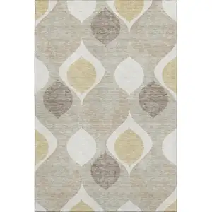 Photo of Beige Ivory And Gold Ogee Washable Area Rug With UV Protection