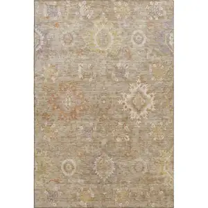 Photo of Beige Ivory And Gold Oriental Washable Area Rug With UV Protection