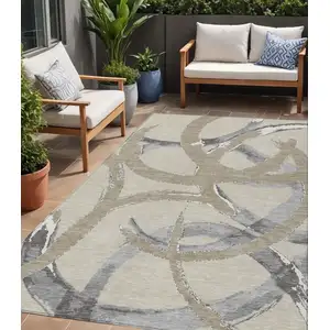 Photo of Beige Ivory And Gray Abstract Washable Indoor Outdoor Area Rug