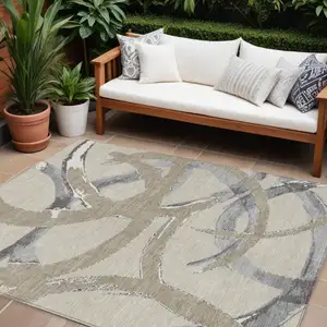 Photo of Beige Ivory And Gray Abstract Washable Indoor Outdoor Area Rug