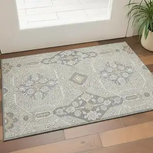 Photo of Beige Ivory And Gray Floral Washable Area Rug With UV Protection