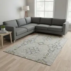 Photo of Beige Ivory And Gray Floral Washable Area Rug With UV Protection