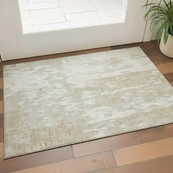Beige Ivory And Tan Abstract Washable Area Rug With UV Protection Photo 2