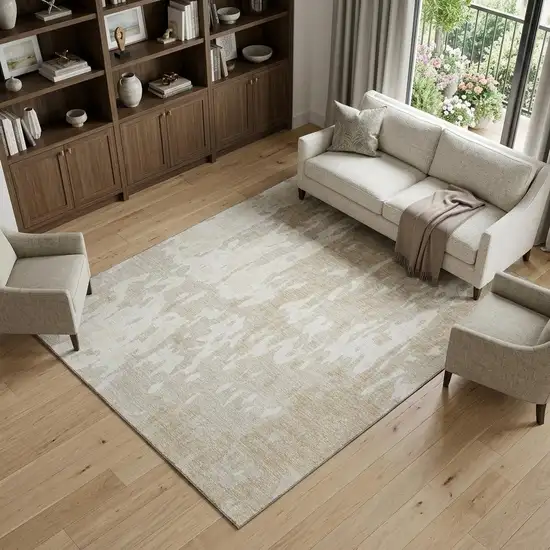 Beige Ivory And Tan Abstract Washable Area Rug With UV Protection Photo 1