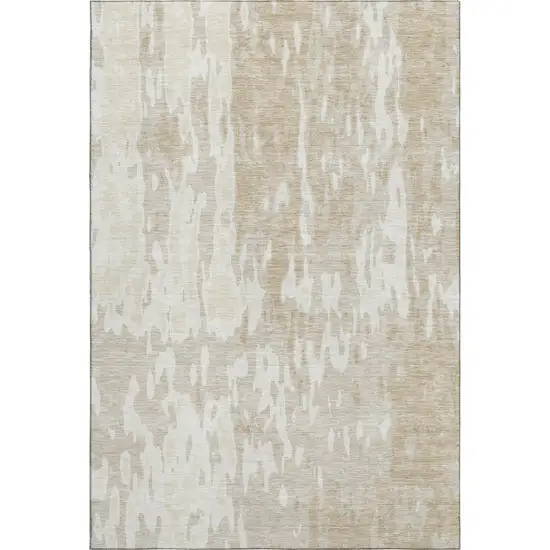 Beige Ivory And Tan Abstract Washable Area Rug With UV Protection Photo 1