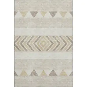 Photo of Beige Ivory And Tan Southwestern Washable Area Rug With UV Protection