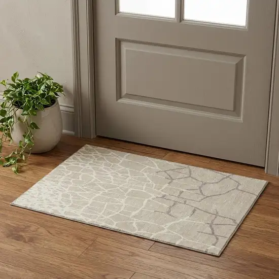 Beige Ivory And Taupe Abstract Geometric Washable Area Rug With UV Protection Photo 1