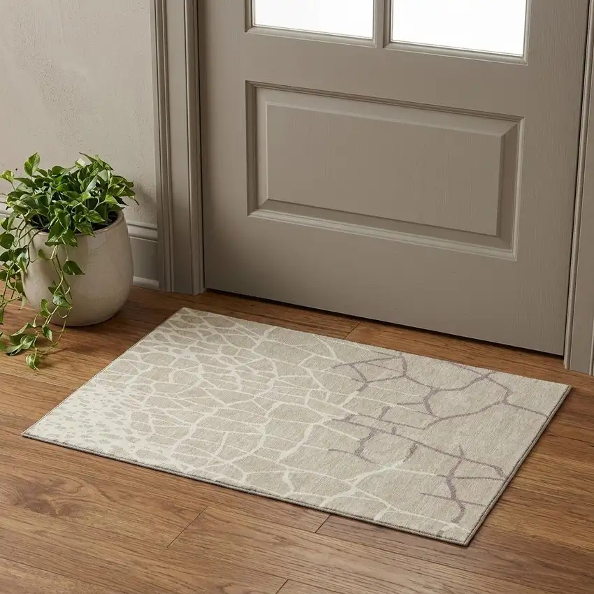 Beige Ivory And Taupe Abstract Geometric Washable Area Rug With UV Protection Photo 1