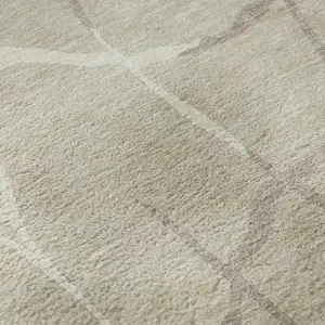 Photo of Beige Ivory And Taupe Abstract Geometric Washable Area Rug With UV Protection