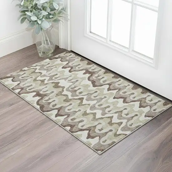Beige Ivory And Taupe Abstract Washable Area Rug With UV Protection Photo 2