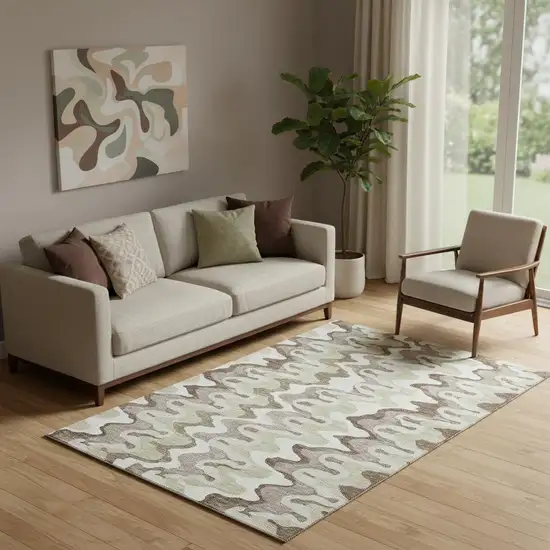 Beige Ivory And Taupe Abstract Washable Area Rug With UV Protection Photo 1
