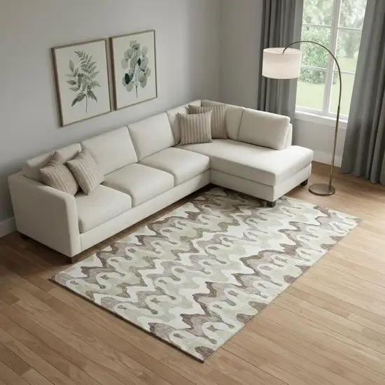 Beige Ivory And Taupe Abstract Washable Area Rug With UV Protection Photo 1