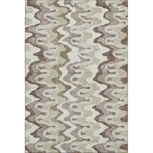 Photo of Beige Ivory And Taupe Abstract Washable Area Rug With UV Protection