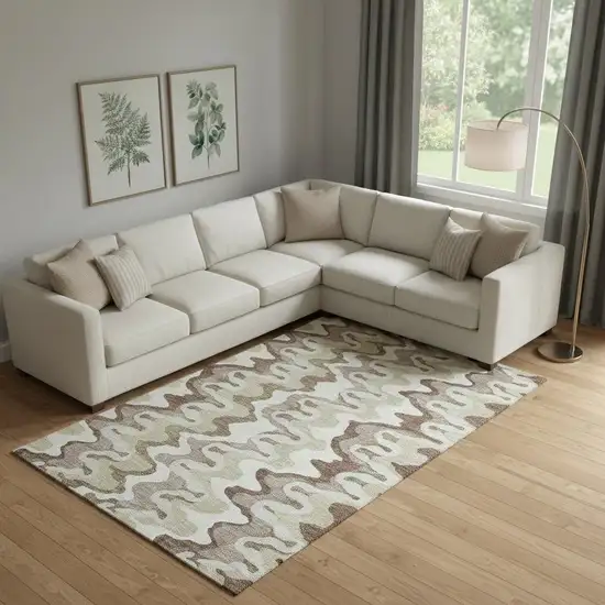 Beige Ivory And Taupe Abstract Washable Area Rug With UV Protection Photo 1