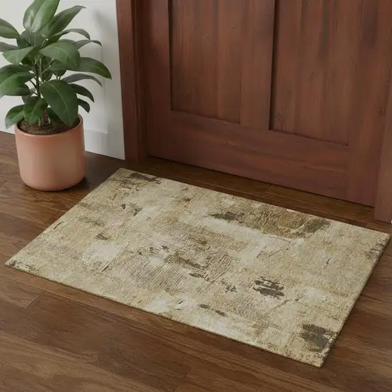 Beige Ivory And Taupe Abstract Washable Area Rug With UV Protection Photo 1