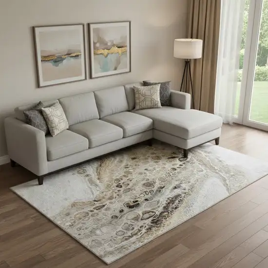 Beige Ivory And Taupe Abstract Washable Area Rug With UV Protection Photo 2