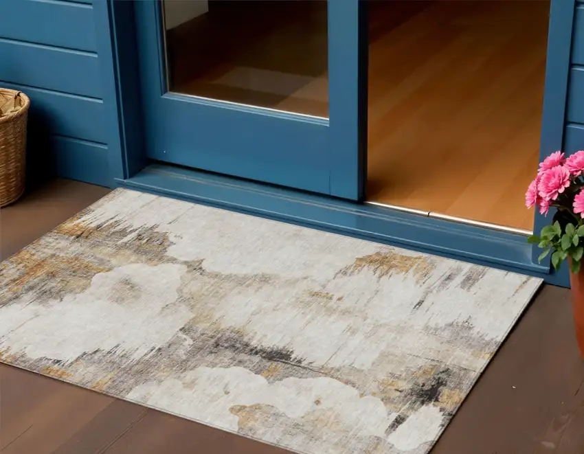 Beige Ivory And Taupe Abstract Washable Indoor Outdoor Area Rug Photo 1