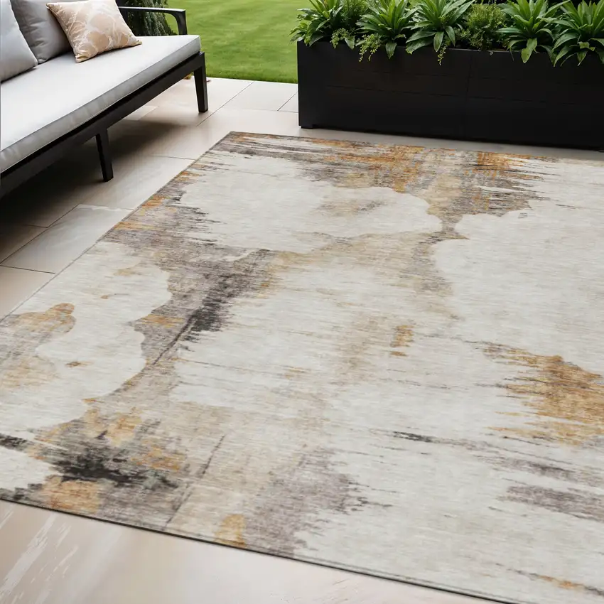 Beige Ivory And Taupe Abstract Washable Indoor Outdoor Area Rug Photo 1