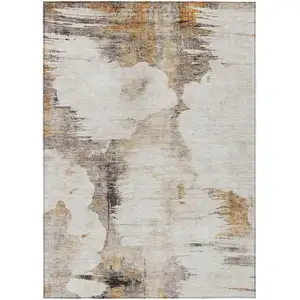 Photo of Beige Ivory And Taupe Abstract Washable Indoor Outdoor Area Rug