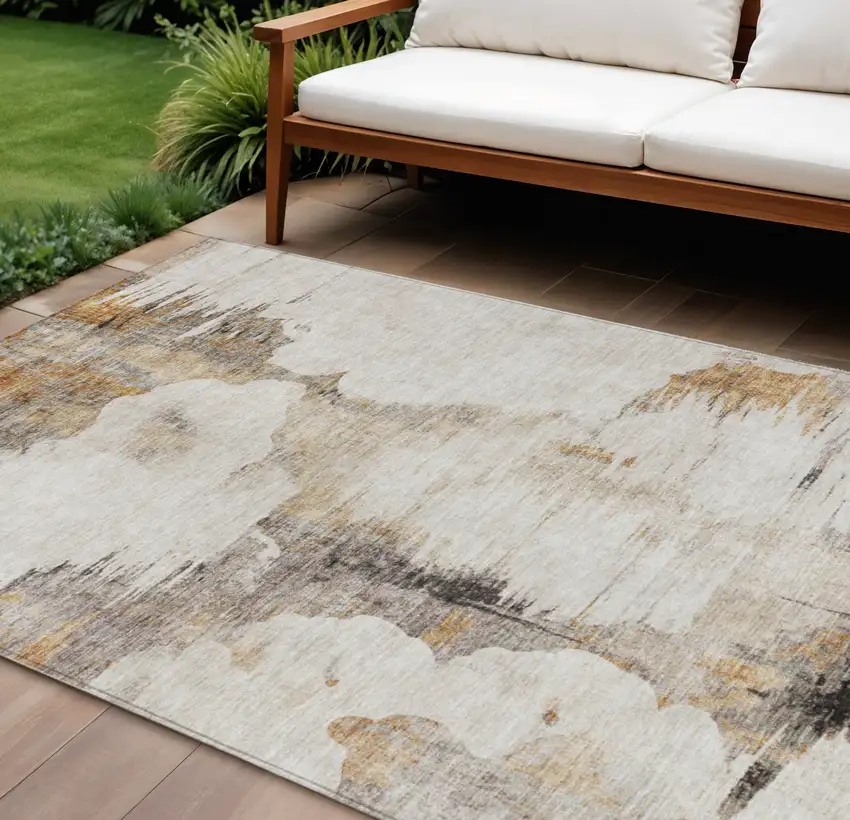Beige Ivory And Taupe Abstract Washable Indoor Outdoor Area Rug Photo 1