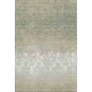 Photo of Beige Ivory And Taupe Damask Washable Area Rug With UV Protection