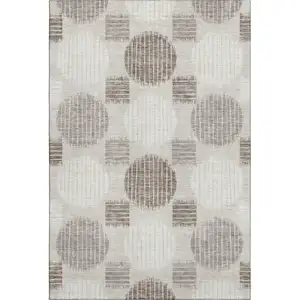 Photo of Beige Ivory And Taupe Geometric Washable Area Rug With UV Protection