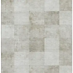 Photo of Beige Ivory And Taupe Geometric Washable Area Rug With UV Protection