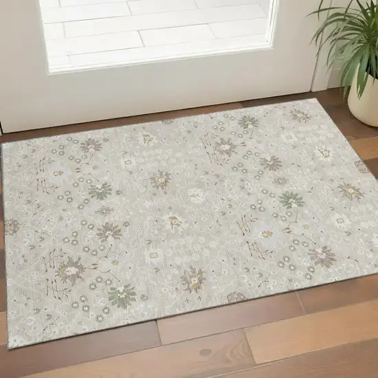 Beige Ivory And Taupe Oriental Washable Area Rug With UV Protection Photo 1