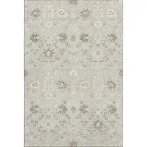 Photo of Beige Ivory And Taupe Oriental Washable Area Rug With UV Protection
