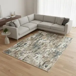 Photo of Beige Ivory And Teal Abstract Area Rug With Fringe
