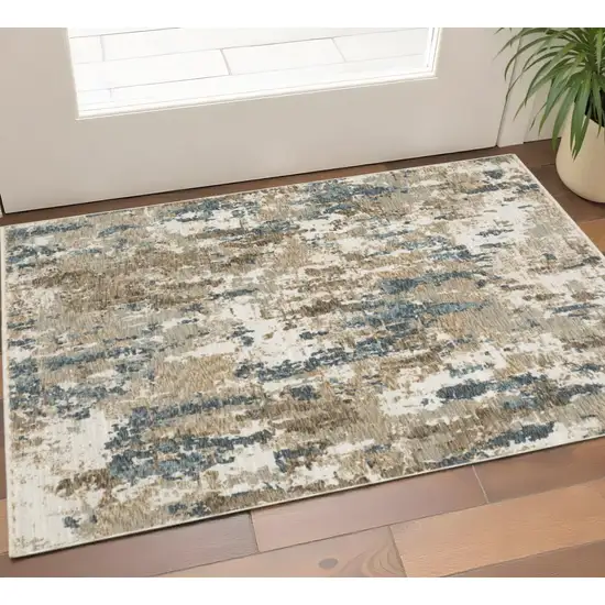 Beige Ivory And Teal Abstract Area Rug With Fringe Photo 1