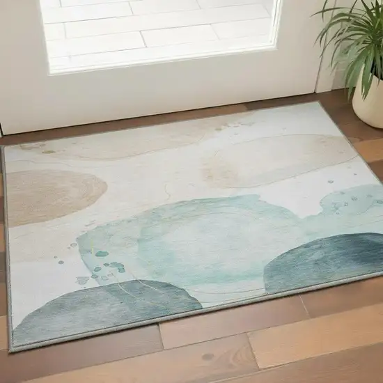 Beige Ivory And Teal Abstract Washable Area Rug With UV Protection Photo 2