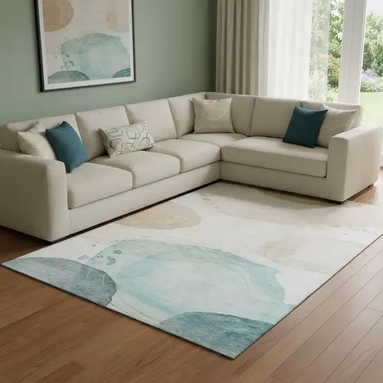 Beige Ivory And Teal Abstract Washable Area Rug With UV Protection Photo 1