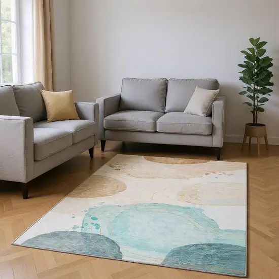 Beige Ivory And Teal Abstract Washable Area Rug With UV Protection Photo 2