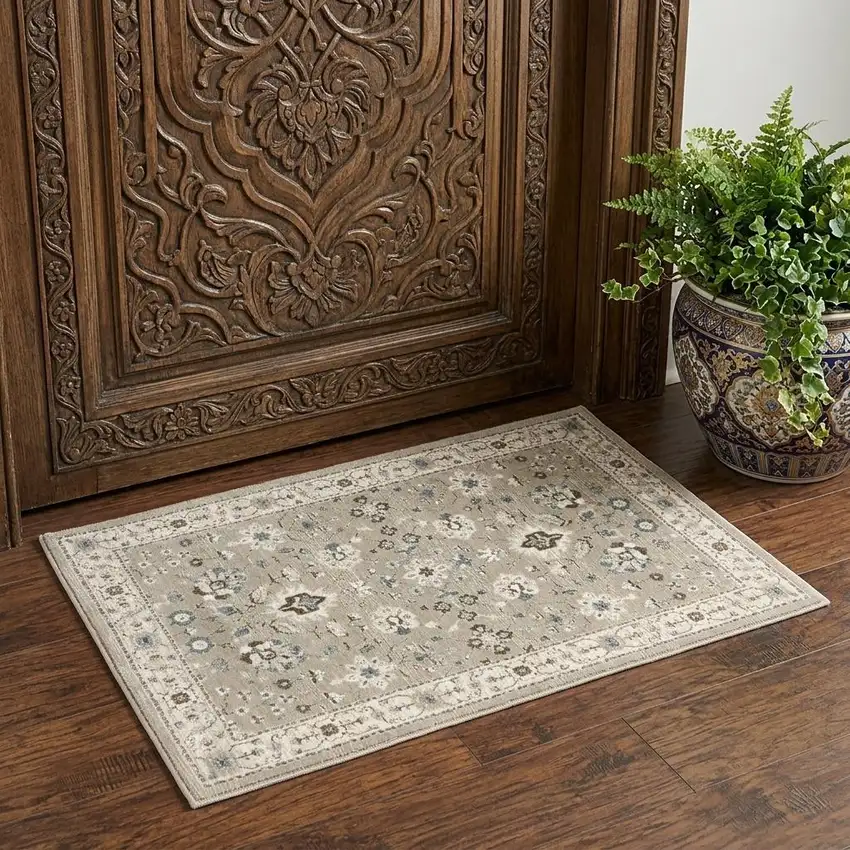 Beige And Ivory Oriental Area Rug Photo 1