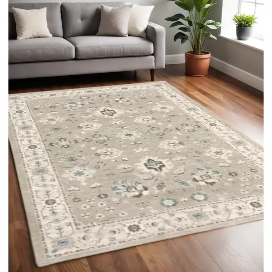 Beige and Ivory Oriental Power Loom Area Rug Photo 1