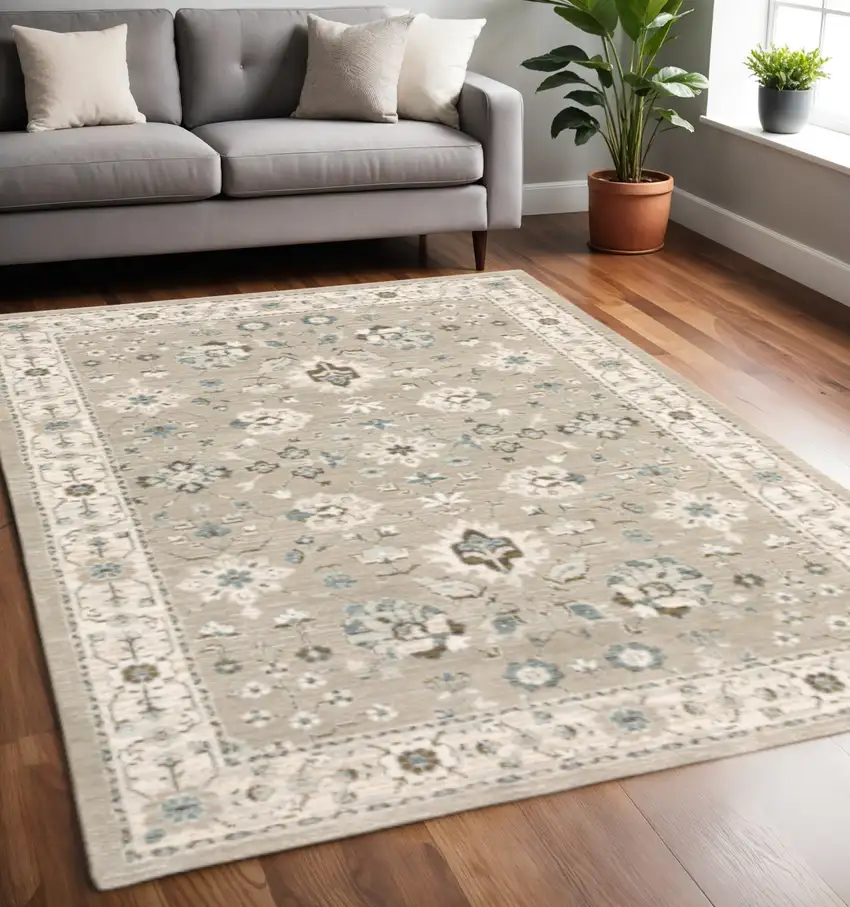 Beige and Ivory Oriental Power Loom Area Rug Photo 1