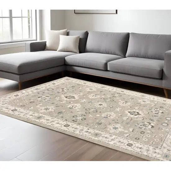 Beige and Ivory Oriental Power Loom Area Rug Photo 1