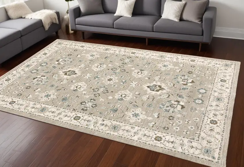 Beige and Ivory Oriental Power Loom Area Rug Photo 1