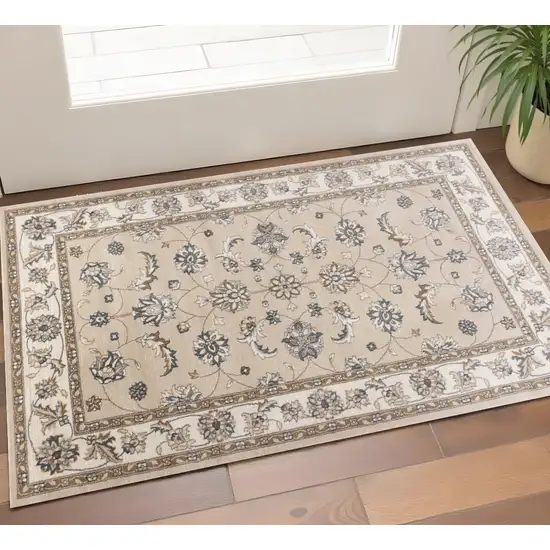 Beige And Ivory Floral Medallion Area Rug Photo 1
