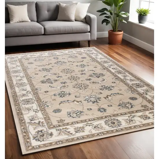 Beige And Ivory Floral Medallion Area Rug Photo 1