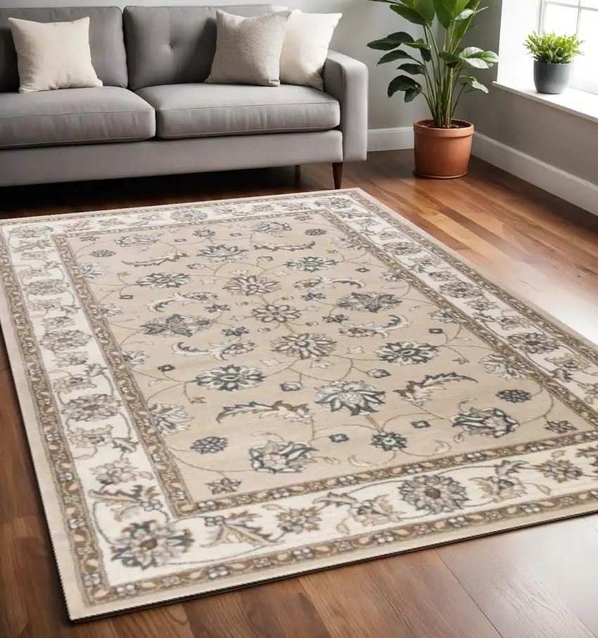 Beige And Ivory Floral Medallion Area Rug Photo 1