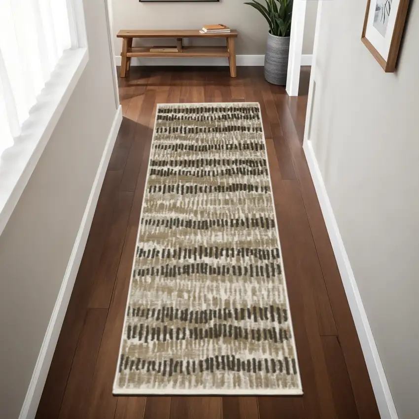 2' X 8' Beige Ivory Charcoal Brown Tan And Grey Abstract Power Loom Stain Resistant Runner Rug With Fringe Photo 1