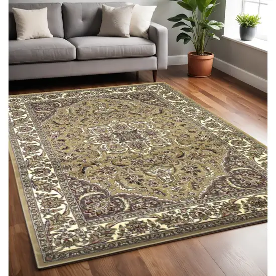 Beige And Ivory Floral Medallion Area Rug Photo 1