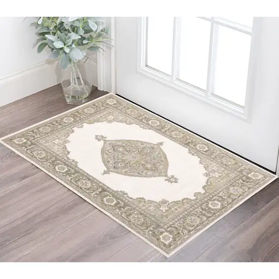 Beige And Ivory Oriental Area Rug Photo 1