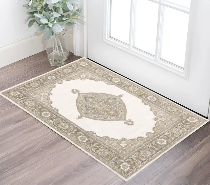 Beige And Ivory Oriental Area Rug Photo 1