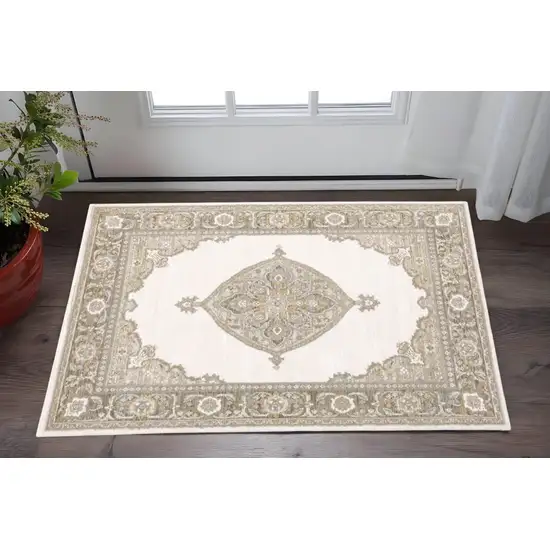 Beige and Ivory Oriental Power Loom Area Rug Photo 1