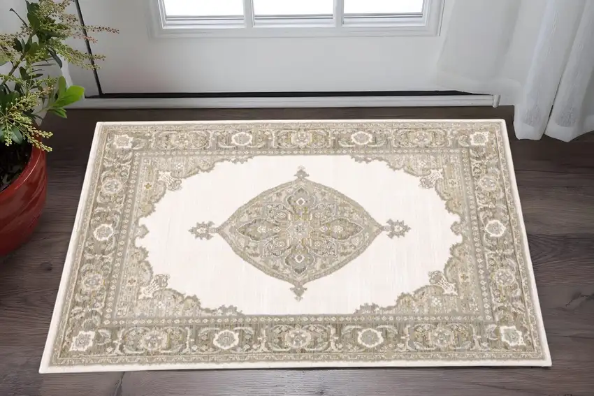Beige and Ivory Oriental Power Loom Area Rug Photo 1