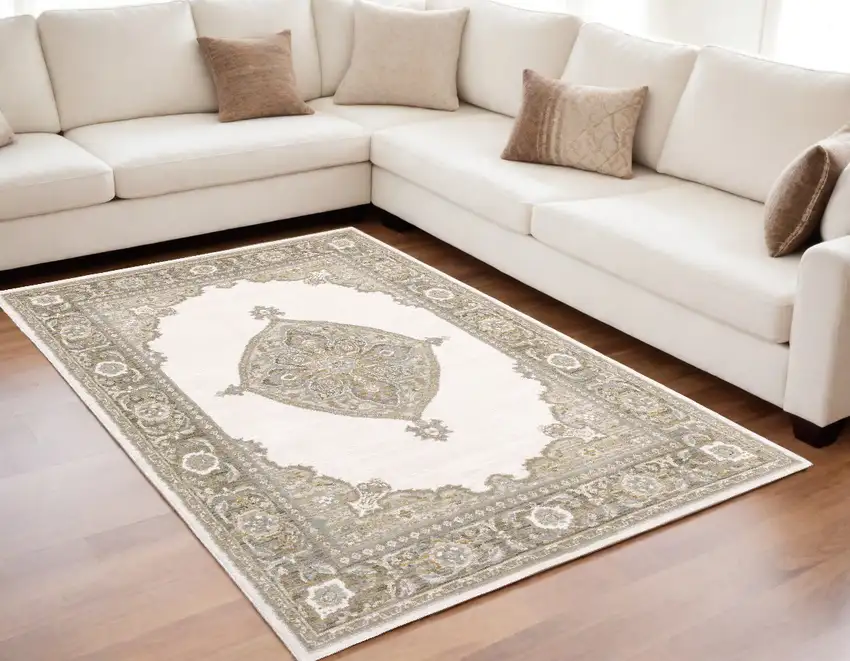 Beige and Ivory Oriental Power Loom Area Rug Photo 1